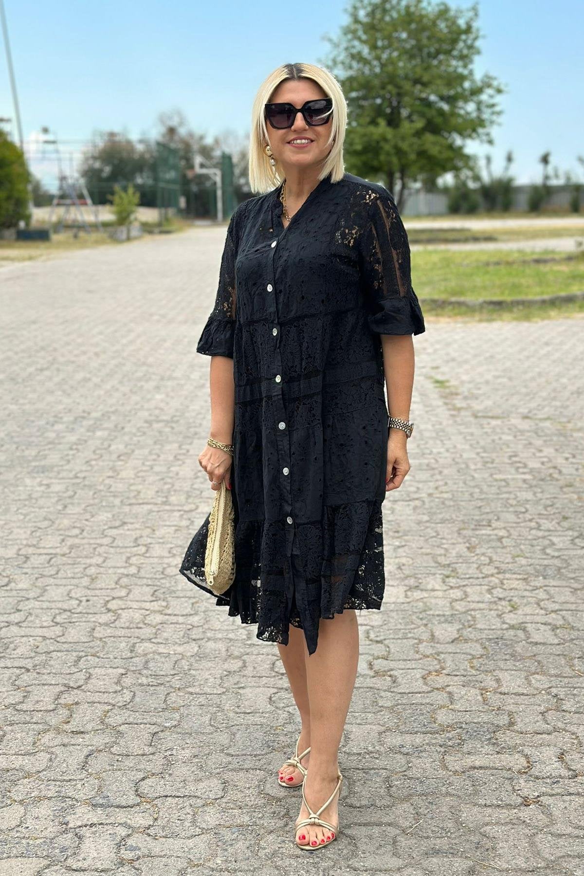 Mirelle – Robe intemporelle avec des détails raffinés